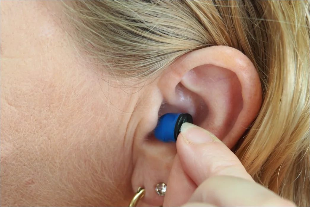 Detail Hearing Aids In Hand Close Up Number 8