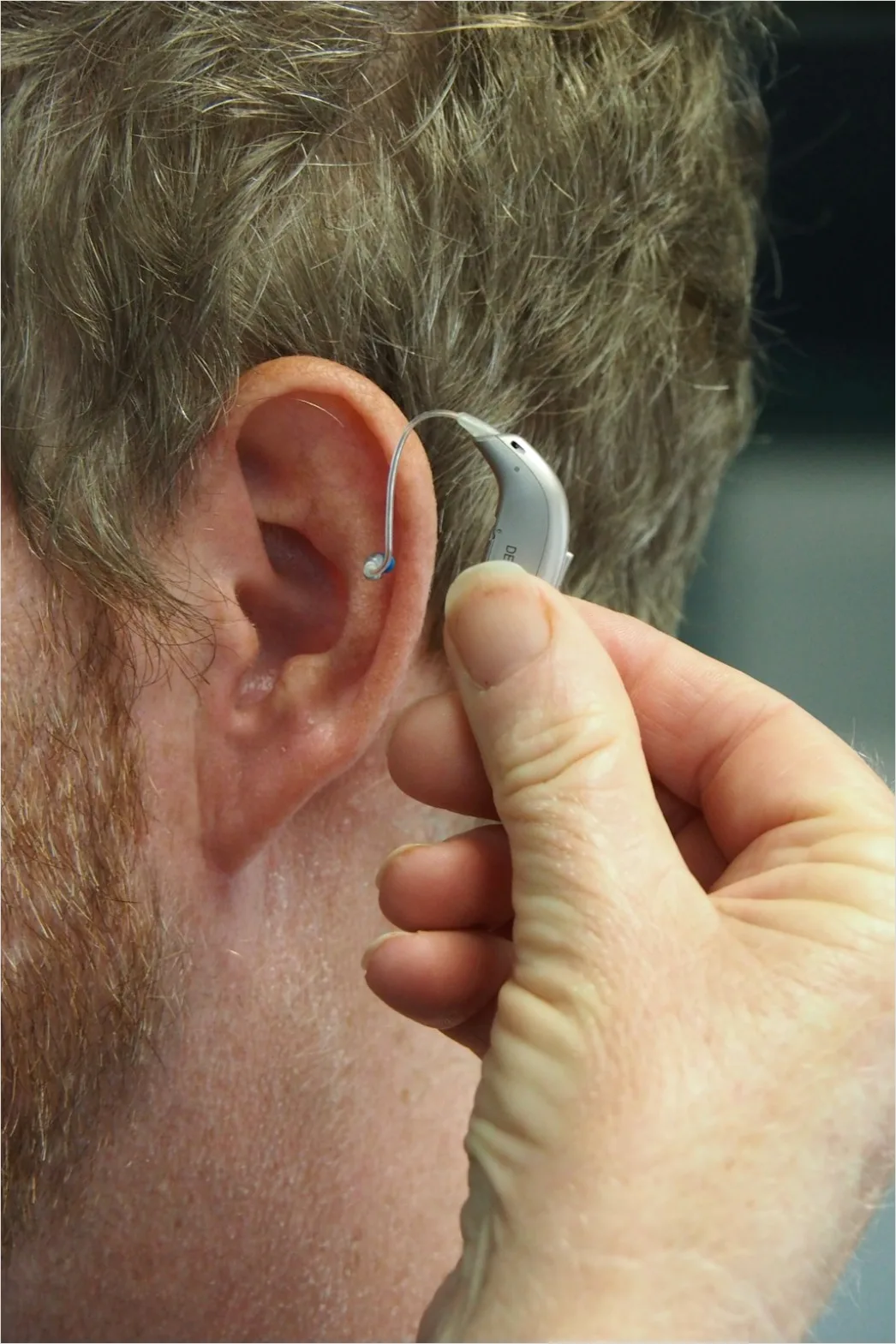 Detail Hearing Aids In Hand Close Up Number 10