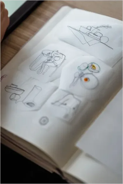 Detail Illustration Portfolio Pages On Table Number 9
