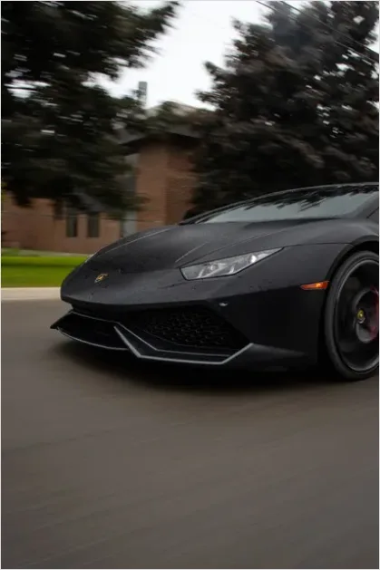 Detail Modern Sports Car Driving Fast Photo Number 2