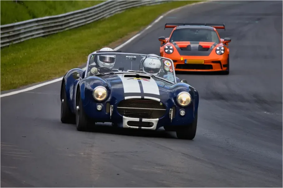 Detail Modern Sports Car Driving Fast Photo Number 15