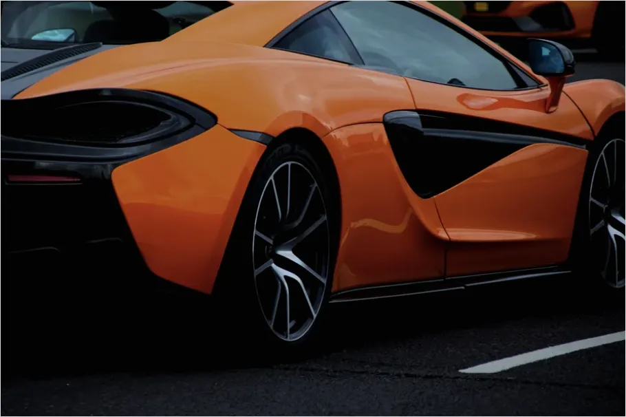 Detail Modern Sports Car Driving Fast Photo Number 4