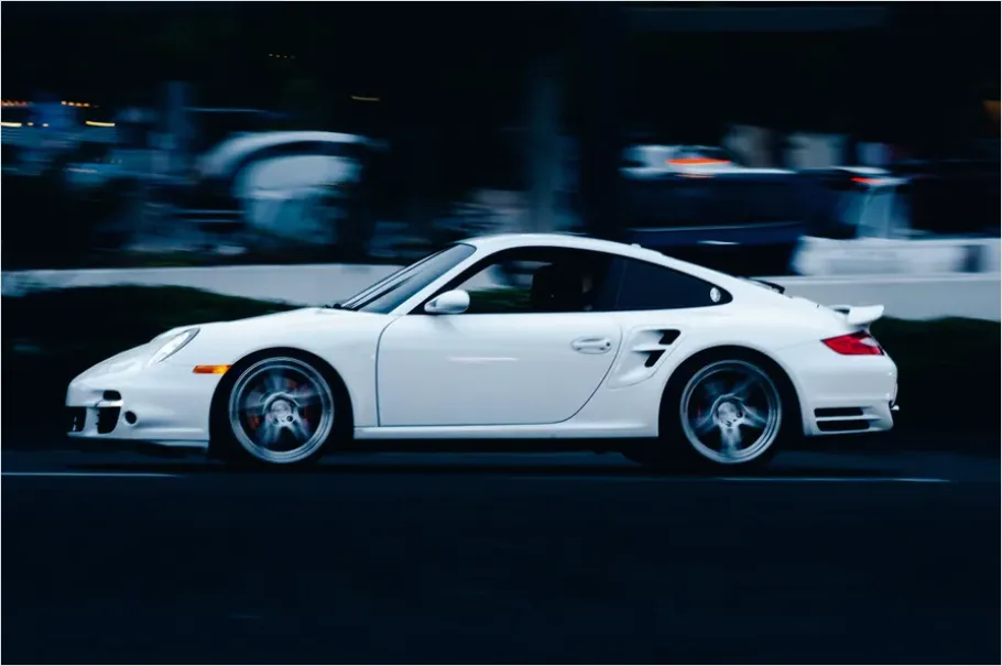 Detail Modern Sports Car Driving Fast Photo Number 8