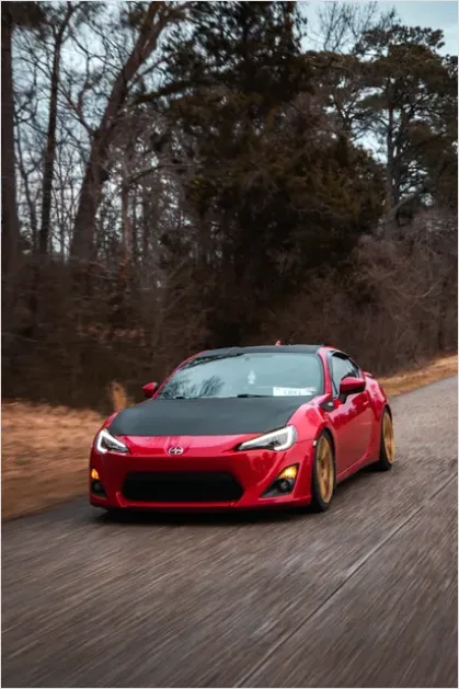 Detail Modern Sports Car Driving Fast Photo Number 9