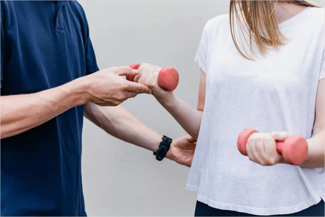 Physical Therapist Guiding Patient Exercise 762c