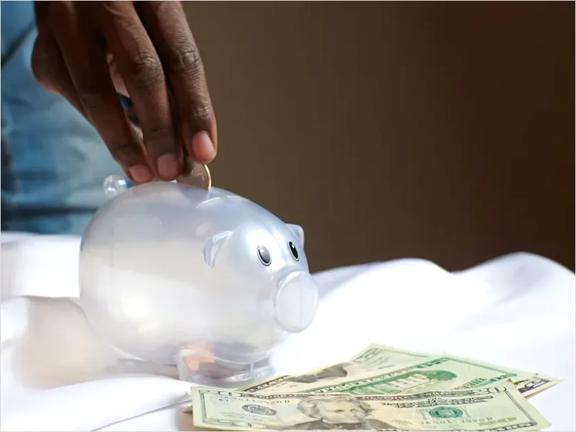 Detail Piggy Bank And Coins On Table Photo Number 14