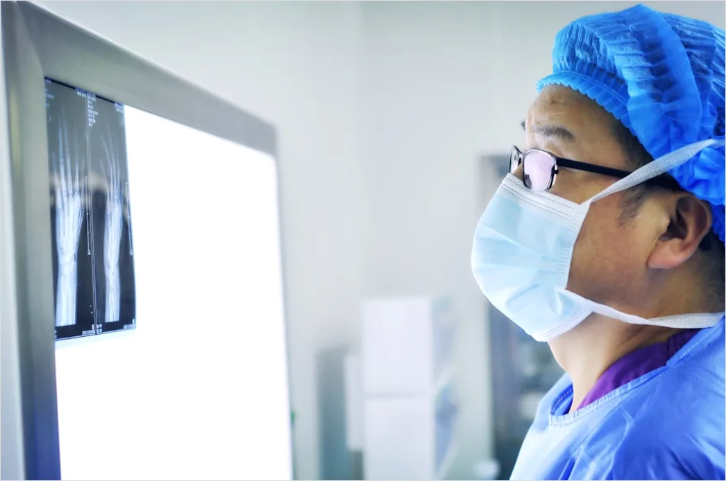 Detail Radiologist Analyzing Scans Workstation Number 11