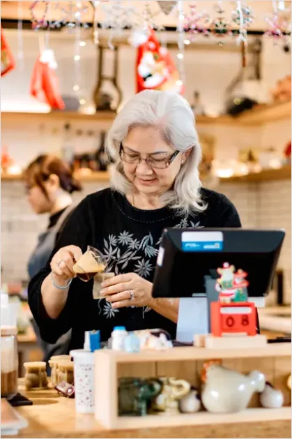 Detail Small Business Owner At Counter Photo Number 14