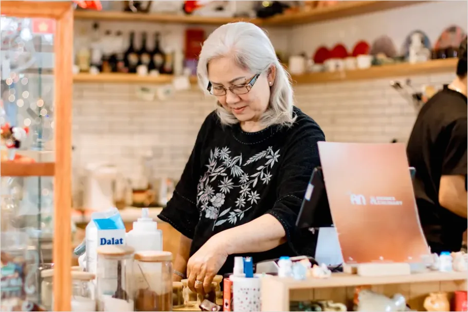 Detail Small Business Owner At Counter Photo Number 6