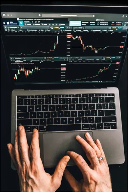 Detail Stock Market Chart On Laptop Photo Number 4
