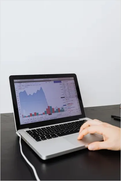 Detail Stock Market Chart On Laptop Photo Number 5