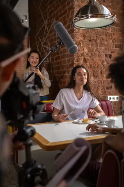 Detail Boom Microphone Over Actors Photo Number 2