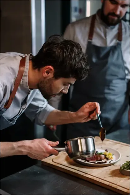 Detail Chef Plating At Food Festival Photo Number 16