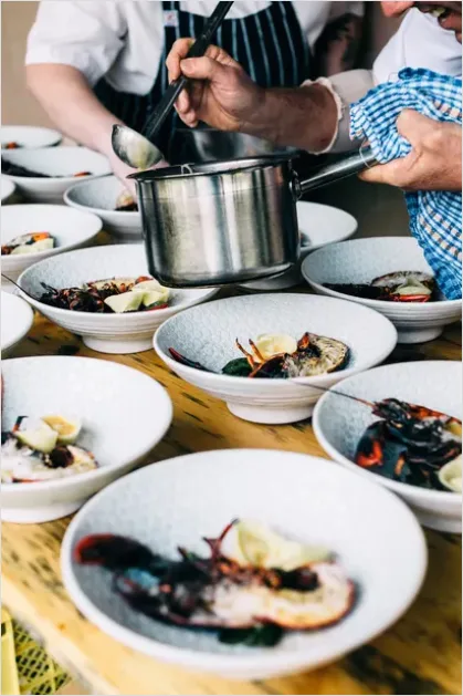 Detail Chef Plating At Food Festival Photo Number 5