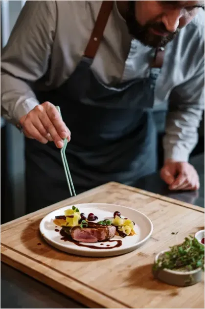 Detail Chef Plating At Food Festival Photo Number 6