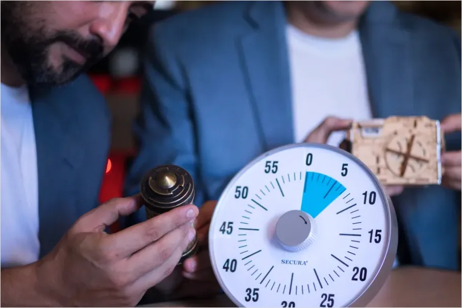 Detail Escape Room Team Solving Puzzle Photo Number 2