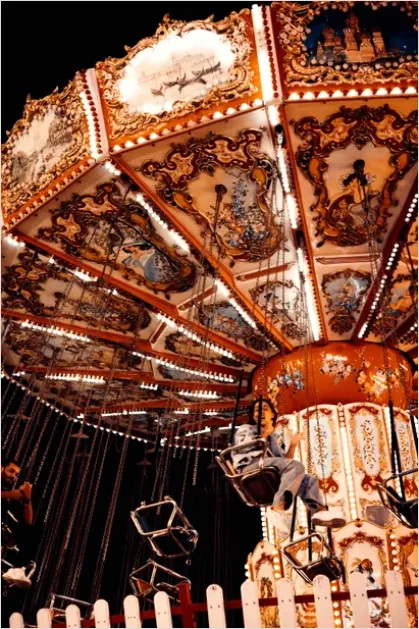 Detail Family Riding Carousel Photo Number 6