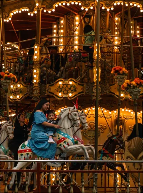 Detail Family Riding Carousel Photo Number 7