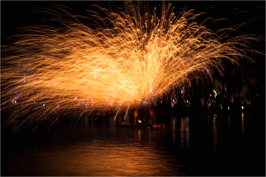 Detail Fireworks Reflection On Water Long Exposure Number 16