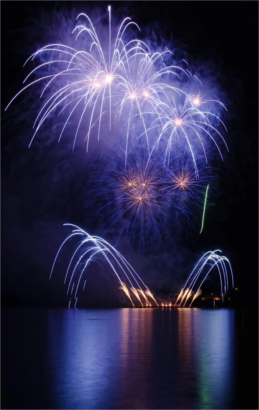 Detail Fireworks Reflection On Water Long Exposure Number 3