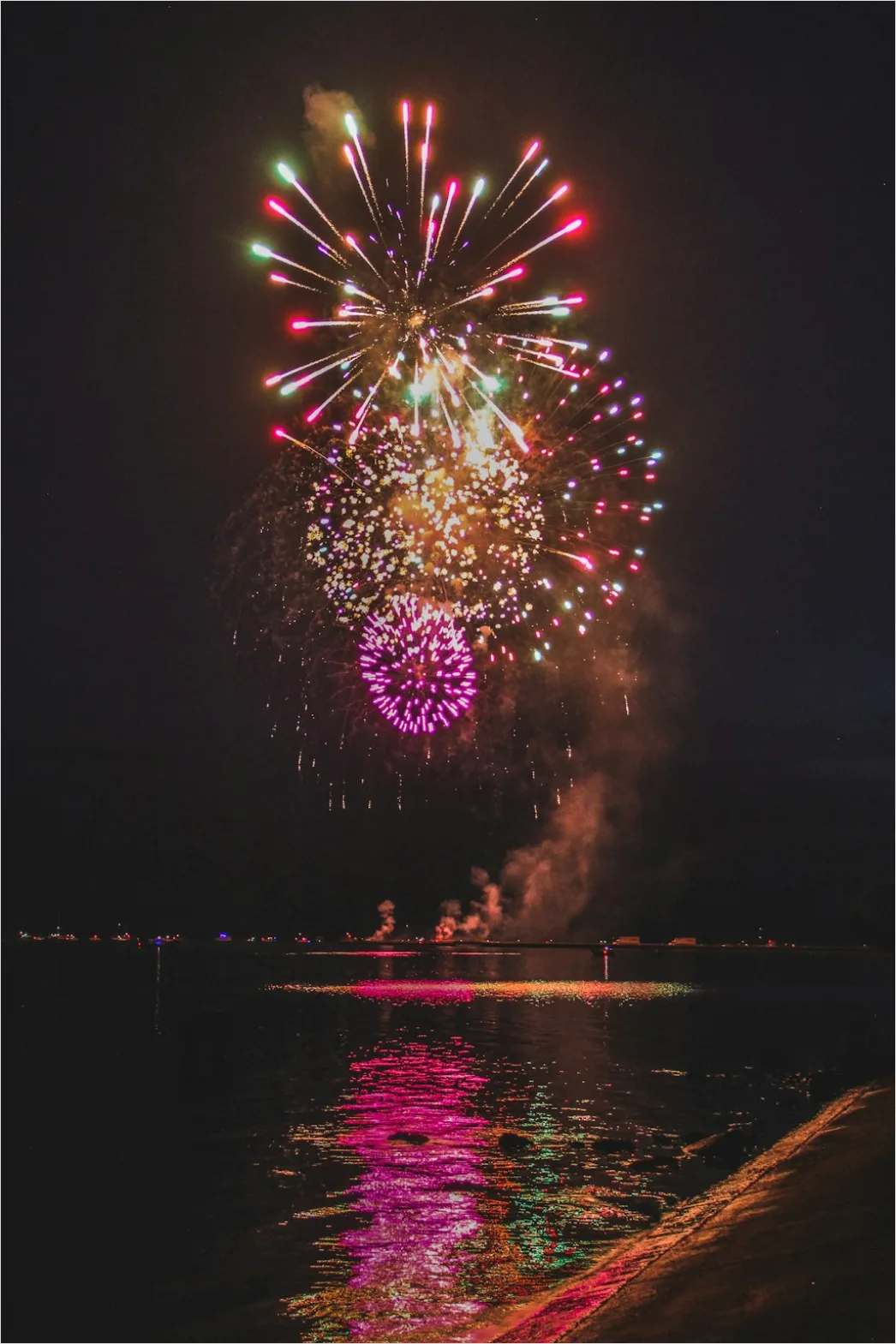 Detail Fireworks Reflection On Water Long Exposure Number 4