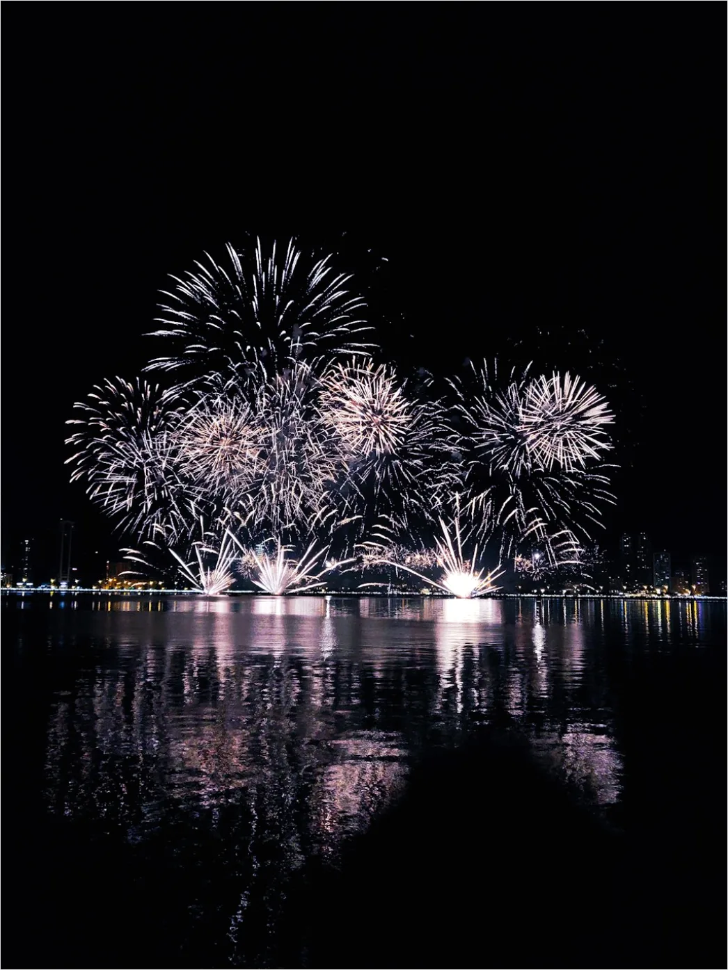 Detail Fireworks Reflection On Water Long Exposure Number 5