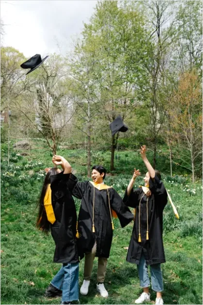 Detail Graduation Ceremony Caps In Air Photo Number 13