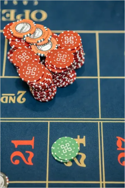Detail Poker Chips On Table Photo Number 11