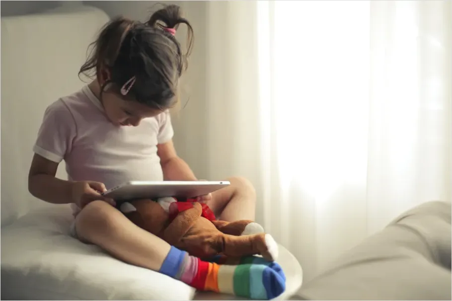 Detail Assistive Communication Device Kid Using Tablet Number 13