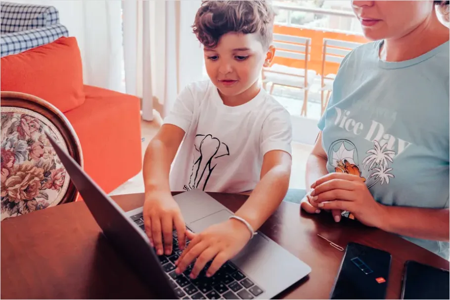 Detail Assistive Communication Device Kid Using Tablet Number 7