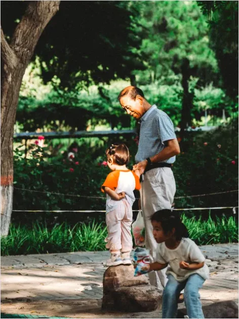 Detail Family Playing In Park Candid Moment Number 14