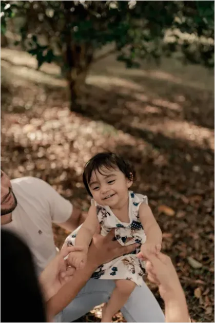 Detail Family Playing In Park Candid Moment Number 15