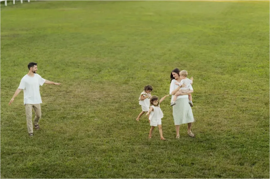 Detail Family Playing In Park Candid Moment Number 6