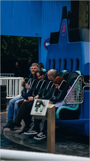 Detail Family Theme Park Ride Excitement Candid Number 2