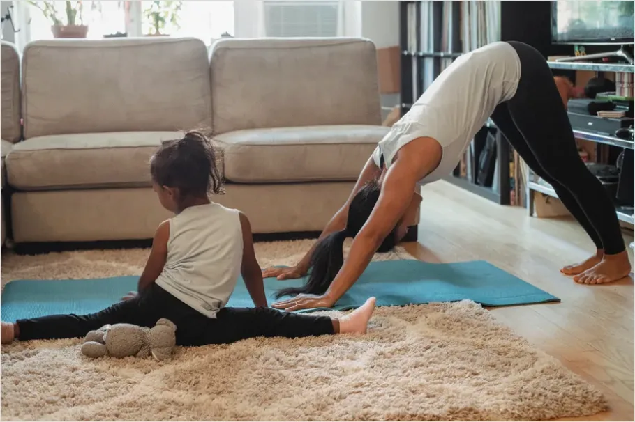 Family Yoga Stretching In Living Room B17d