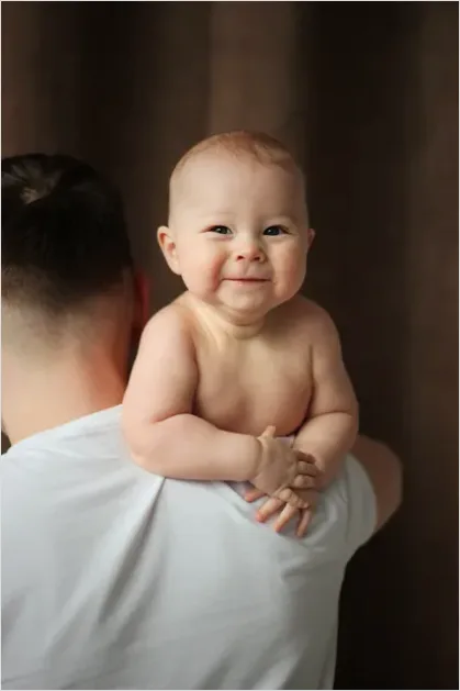 Detail Father Burping Baby Over Shoulder Number 2