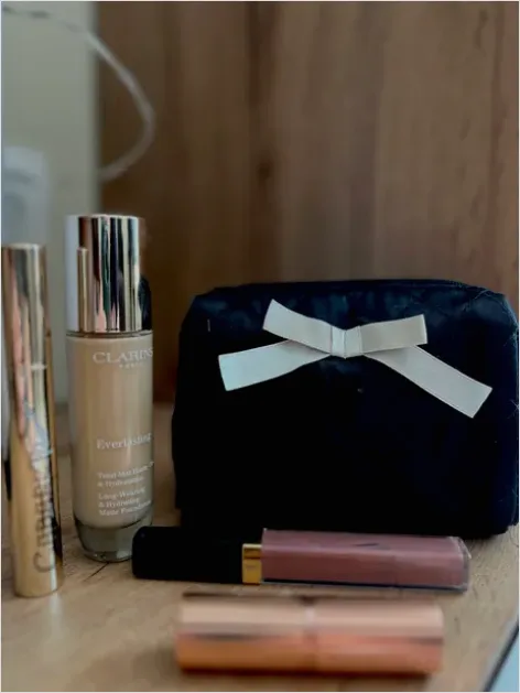 Detail Makeup Bag Essentials Flat Lay Number 11