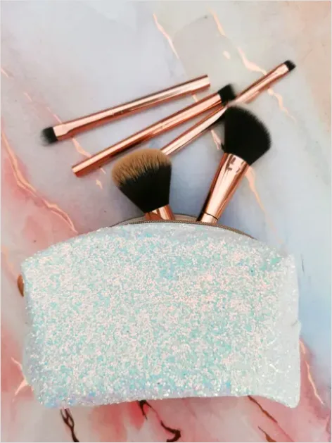 Detail Makeup Bag Essentials Flat Lay Number 14