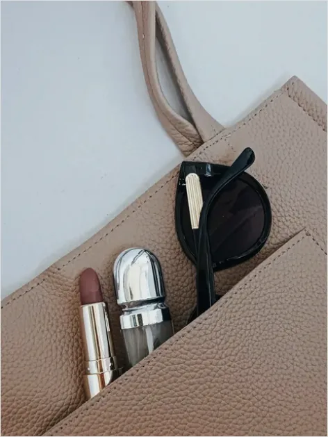 Detail Makeup Bag Essentials Flat Lay Number 16