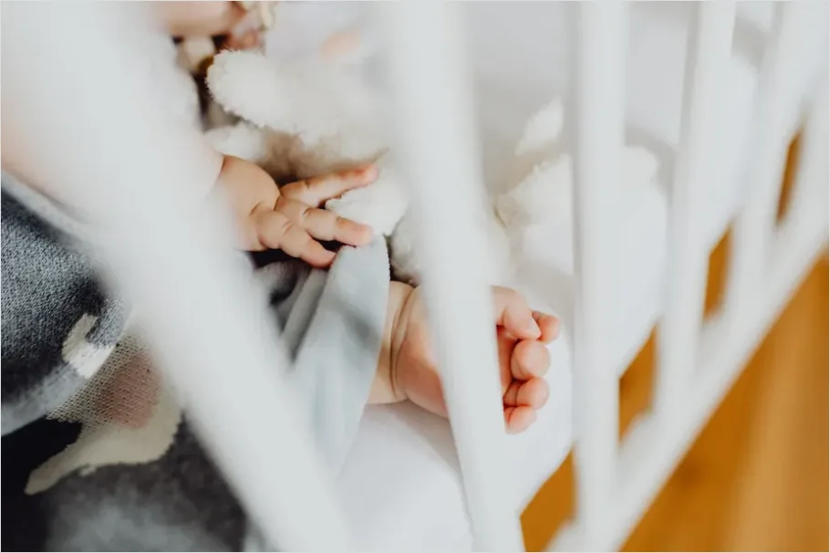 Detail Newborn Baby Sleeping In Crib Number 11