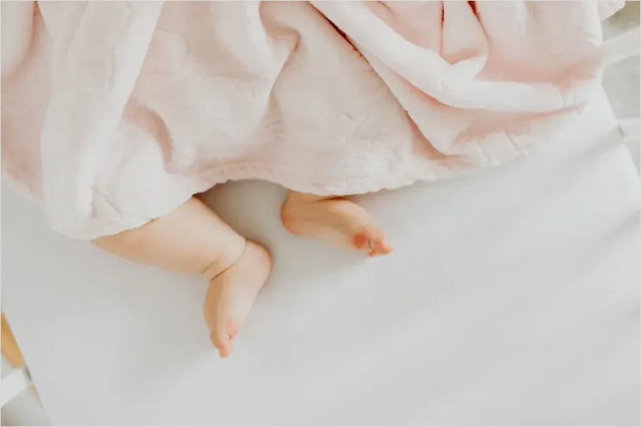Detail Newborn Baby Sleeping In Crib Number 5