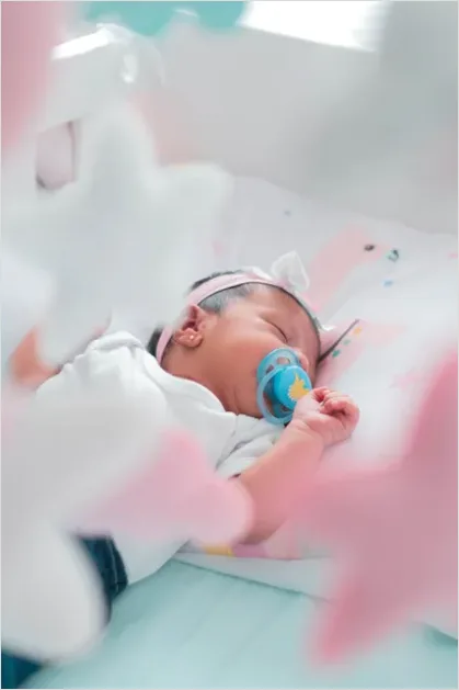 Detail Newborn Baby Sleeping In Crib Number 6