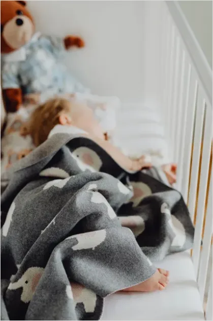 Detail Newborn Baby Sleeping In Crib Number 7