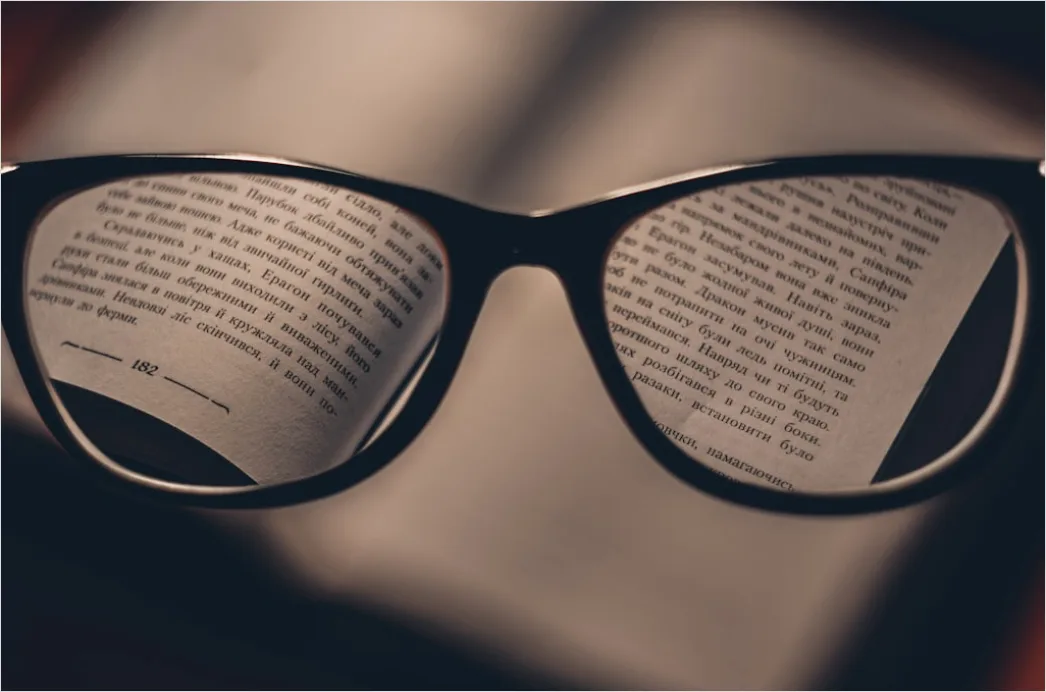 Detail Reading Glasses On Book Number 2