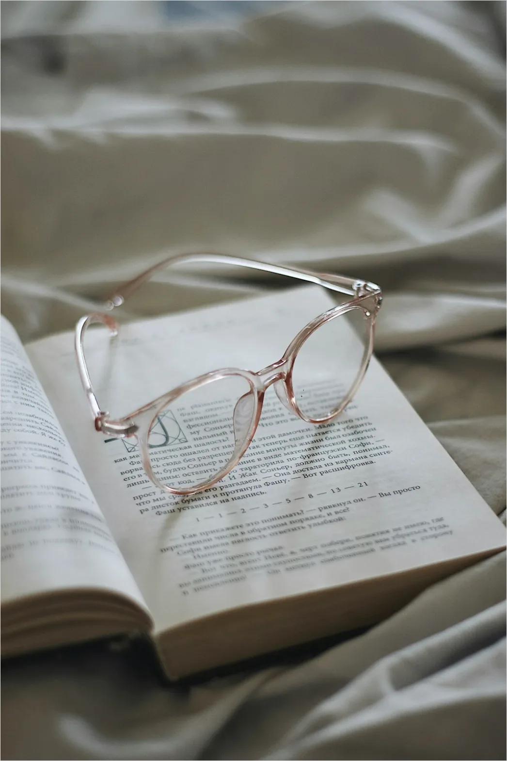 Detail Reading Glasses On Book Number 11