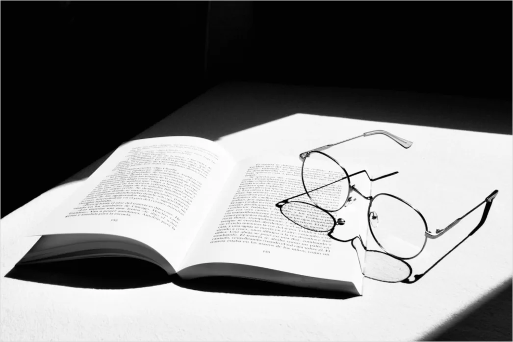 Detail Reading Glasses On Book Number 13