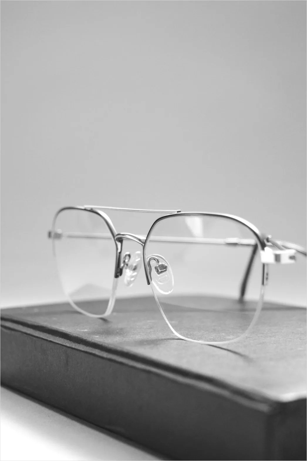Detail Reading Glasses On Book Number 6