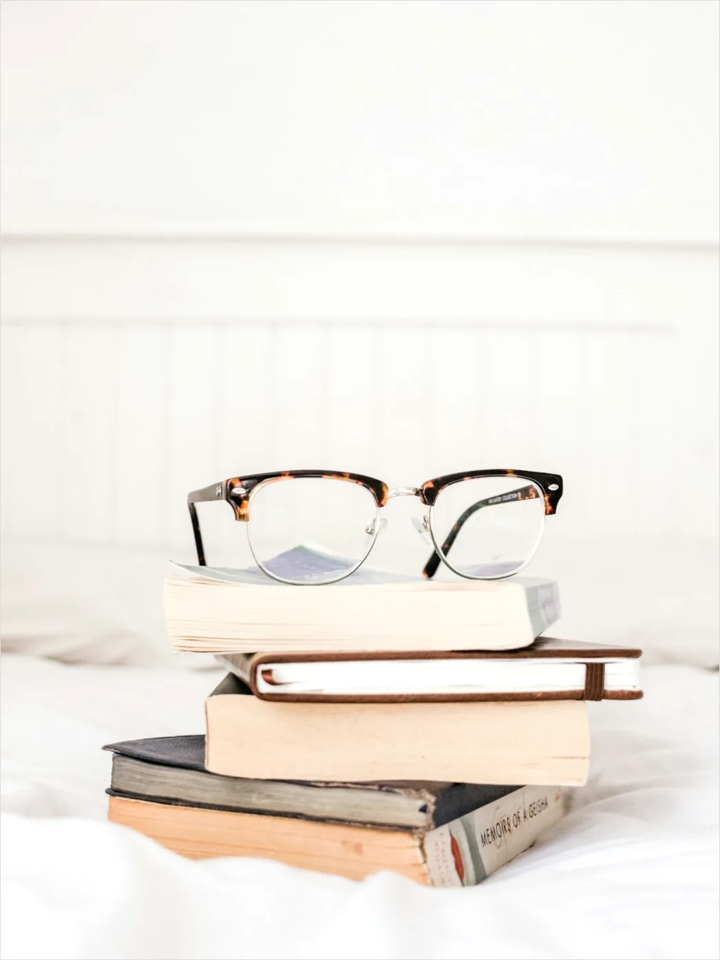 Detail Reading Glasses On Book Number 8