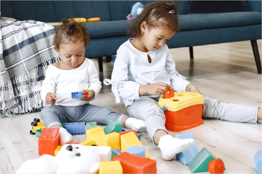 Detail Siblings Playing Together Floor Toys Number 2