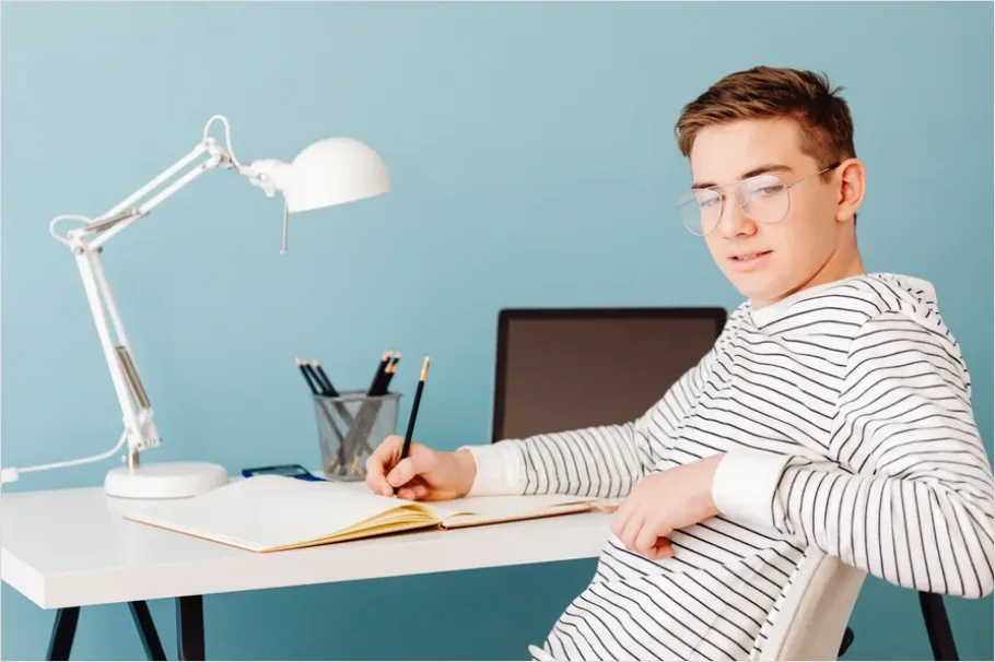 Detail Teen Doing Homework Late Night Desk Number 12